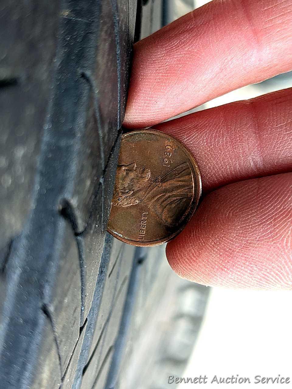 Set of 4 Michelin Latitude Tour HP tires are marked 255 / 55R18. Some weather checking noted in