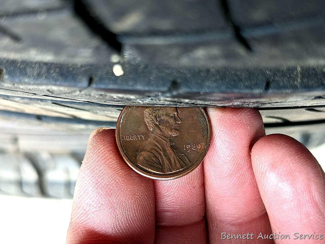 Set of 4 Michelin Latitude Tour HP tires are marked 255 / 55R18. Some weather checking noted in