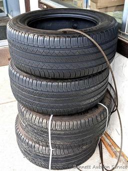 Set of 4 Michelin Latitude Tour HP tires are marked 255 / 55R18. Some weather checking noted in