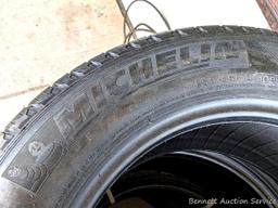 Set of 4 Michelin Latitude Tour HP tires are marked 255 / 55R18. Some weather checking noted in