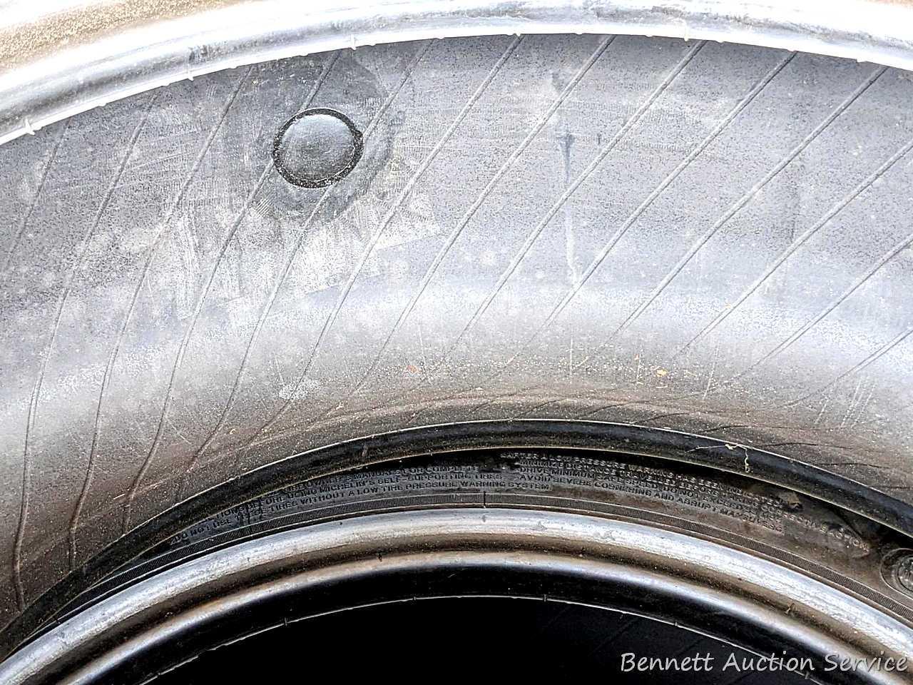 Set of 4 Michelin Latitude Tour HP tires are marked 255 / 55R18. Some weather checking noted in