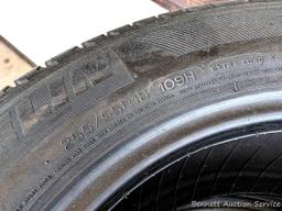 Set of 4 Michelin Latitude Tour HP tires are marked 255 / 55R18. Some weather checking noted in