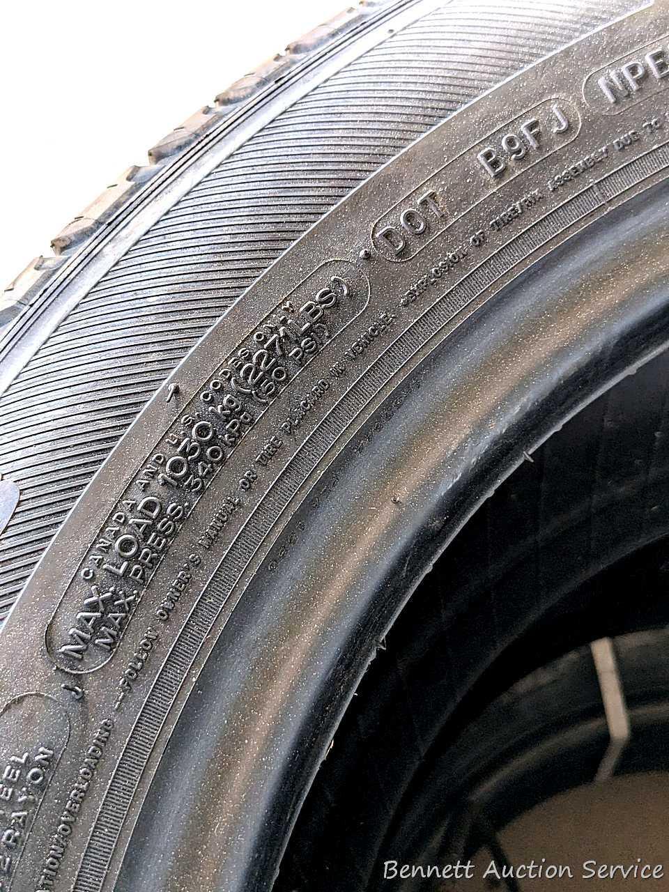 Set of 4 Michelin Latitude Tour HP tires are marked 255 / 55R18. Some weather checking noted in