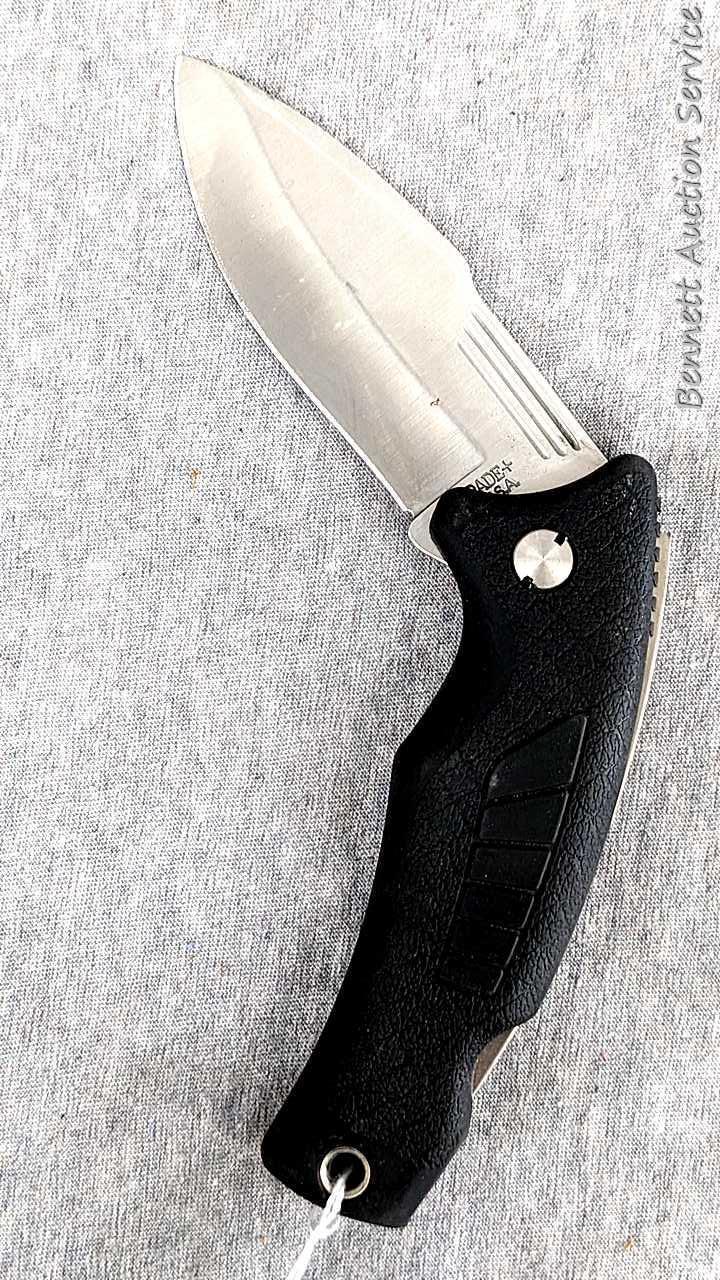 Schrade folding knife, SG8, measures 8-1/2" open. Blade and handle slabs are tight. Made in USA.