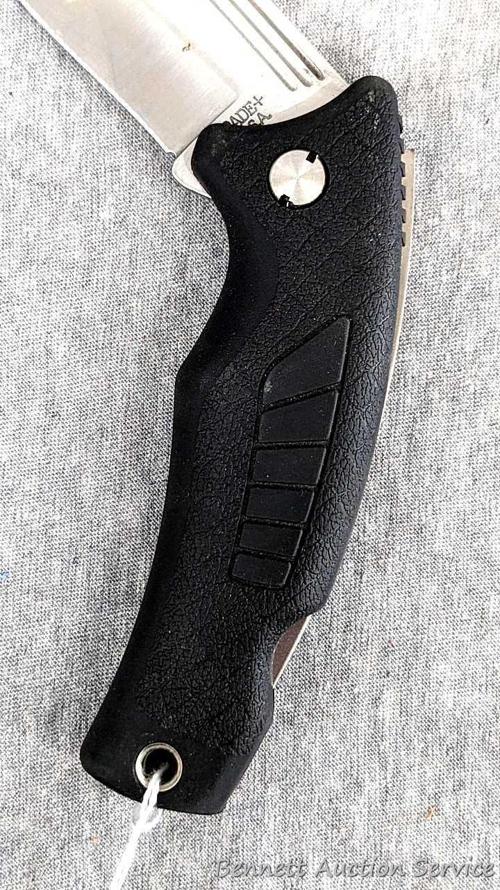 Schrade folding knife, SG8, measures 8-1/2" open. Blade and handle slabs are tight. Made in USA.