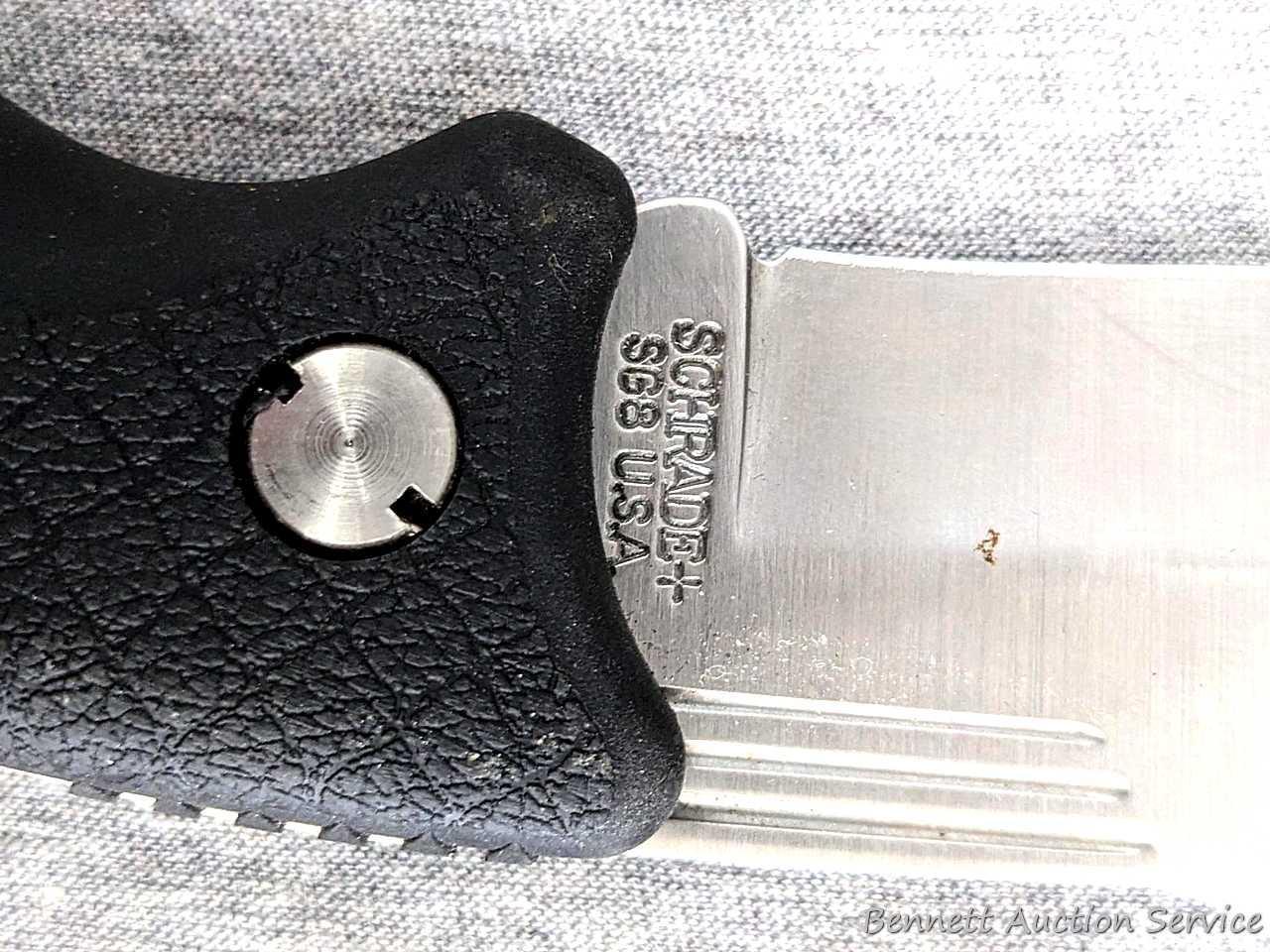 Schrade folding knife, SG8, measures 8-1/2" open. Blade and handle slabs are tight. Made in USA.