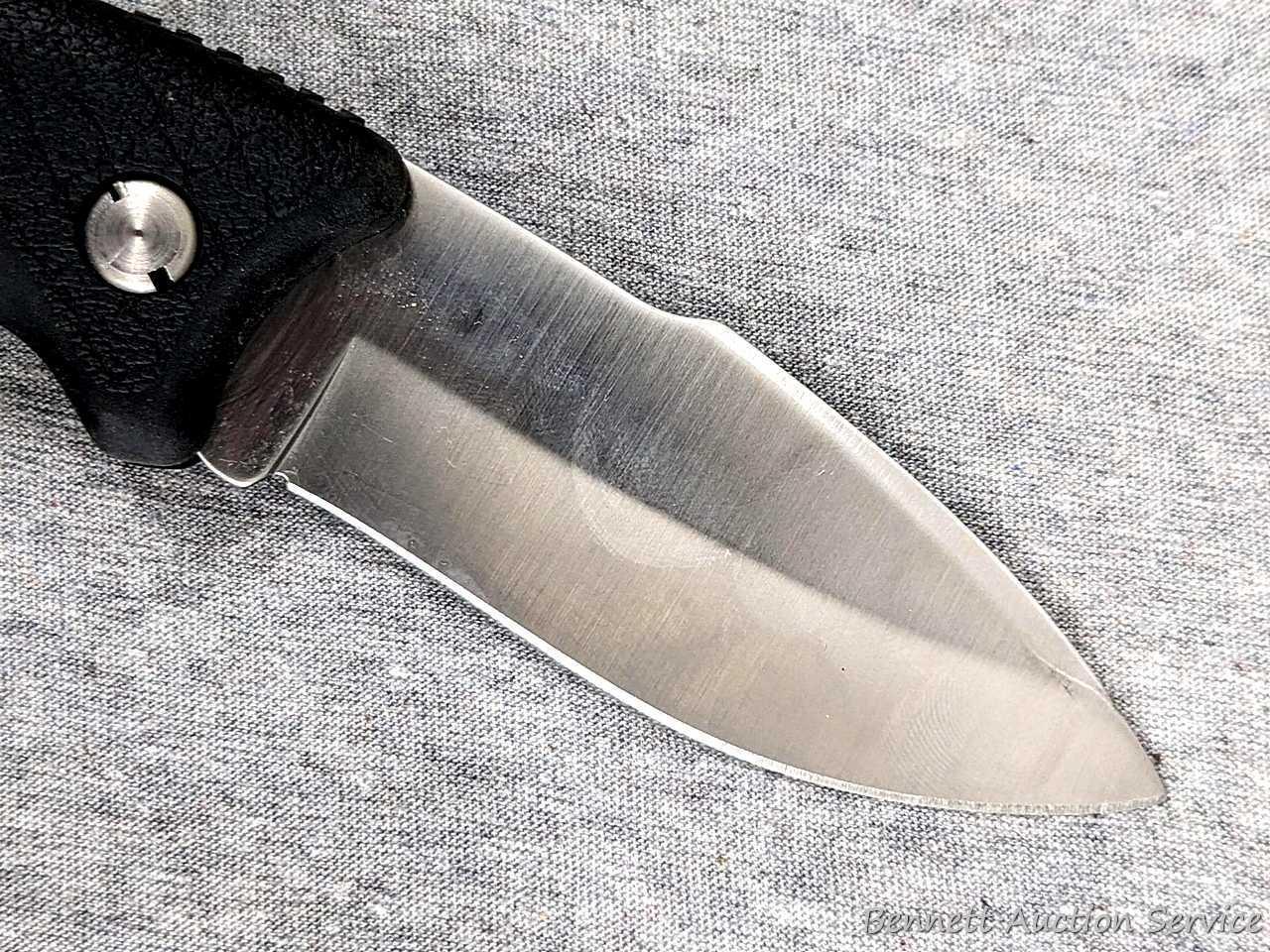 Schrade folding knife, SG8, measures 8-1/2" open. Blade and handle slabs are tight. Made in USA.