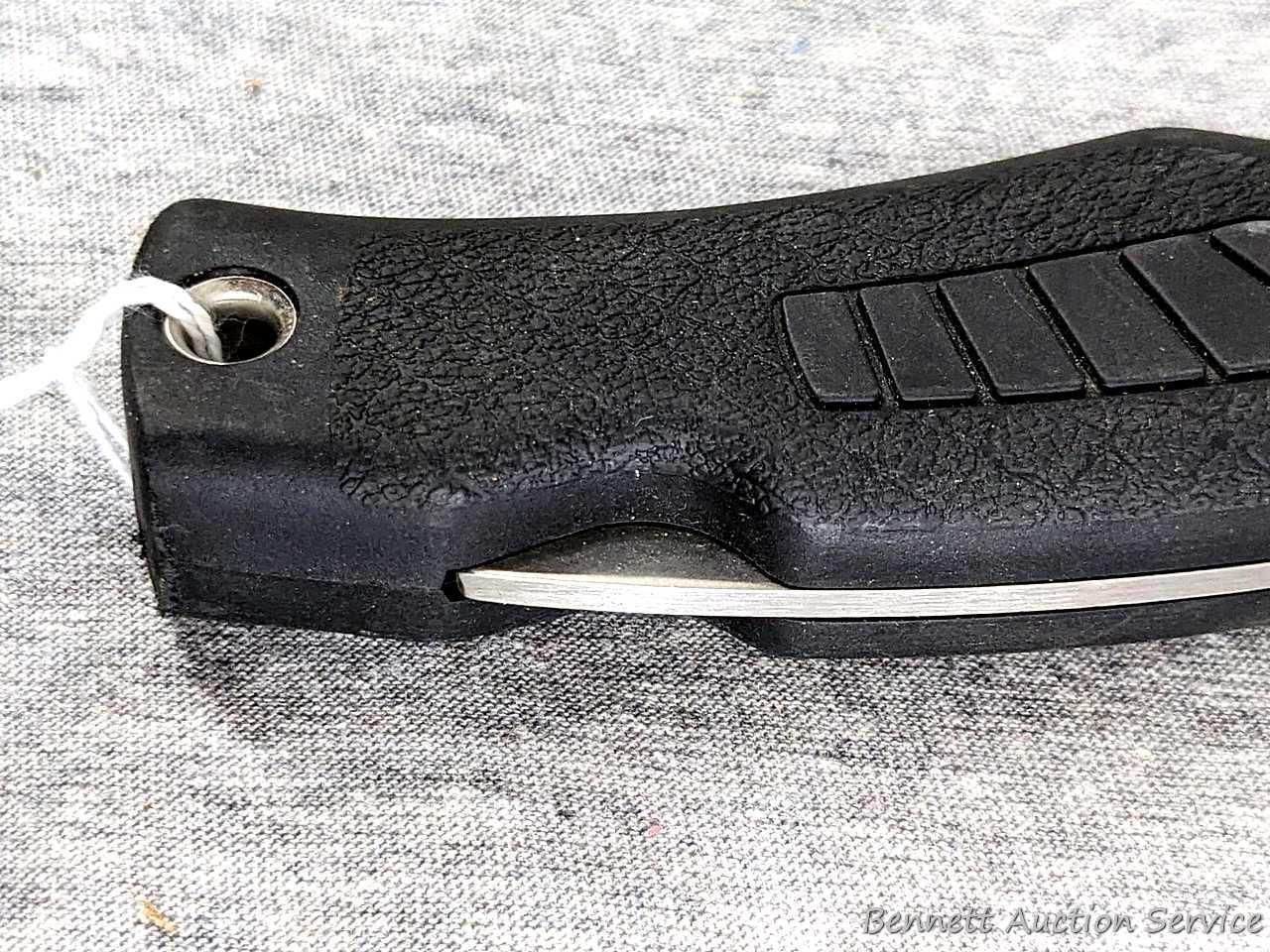 Schrade folding knife, SG8, measures 8-1/2" open. Blade and handle slabs are tight. Made in USA.