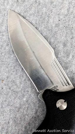 Schrade folding knife, SG8, measures 8-1/2" open. Blade and handle slabs are tight. Made in USA.