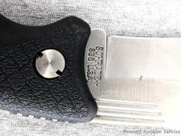 Schrade folding knife, SG8, measures 8-1/2" open. Blade and handle slabs are tight. Made in USA.