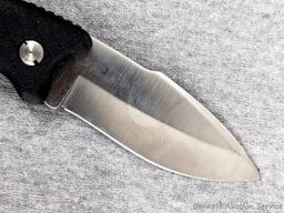 Schrade folding knife, SG8, measures 8-1/2" open. Blade and handle slabs are tight. Made in USA.