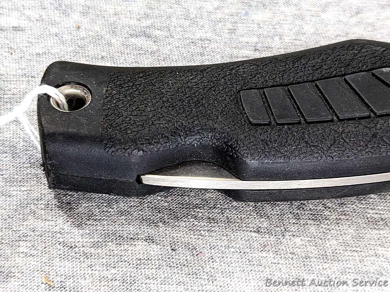 Schrade folding knife, SG8, measures 8-1/2" open. Blade and handle slabs are tight. Made in USA.