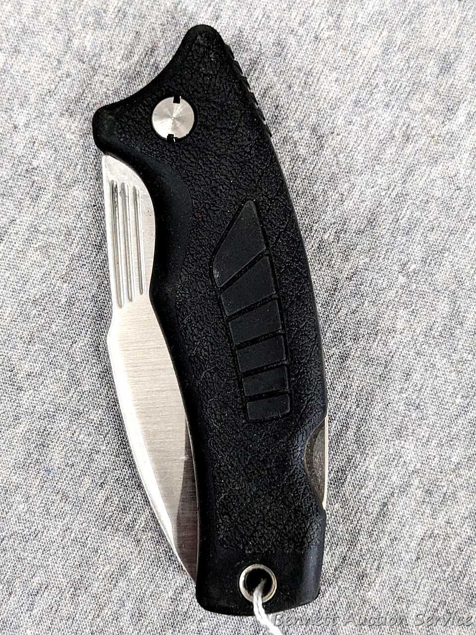 Schrade folding knife, SG8, measures 8-1/2" open. Blade and handle slabs are tight. Made in USA.
