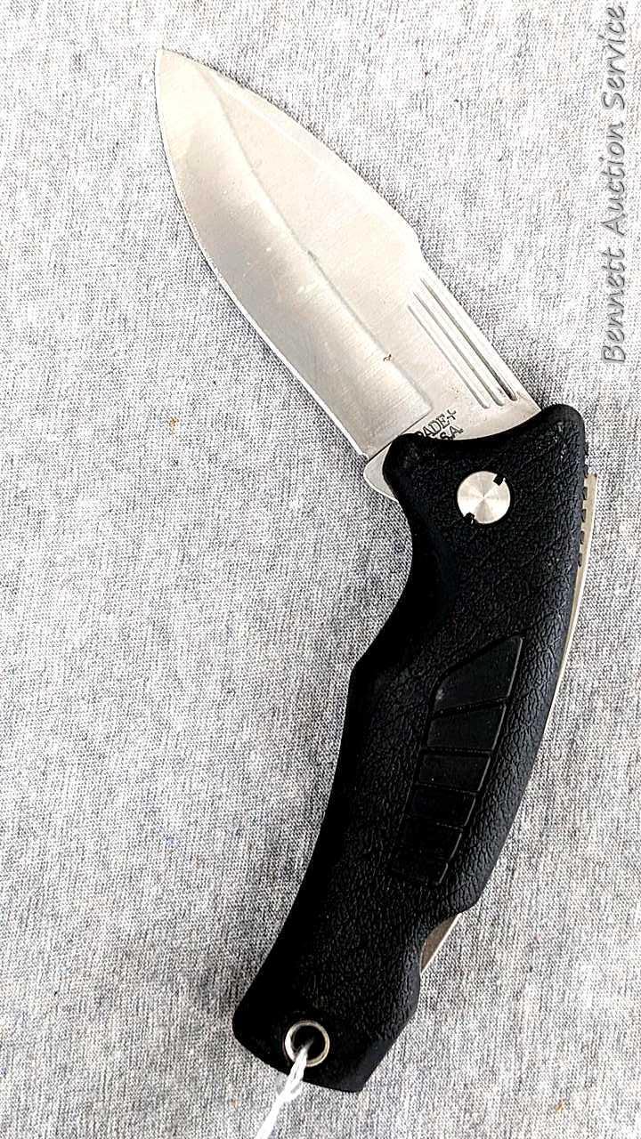 Schrade folding knife, SG8, measures 8-1/2" open. Blade and handle slabs are tight. Made in USA.