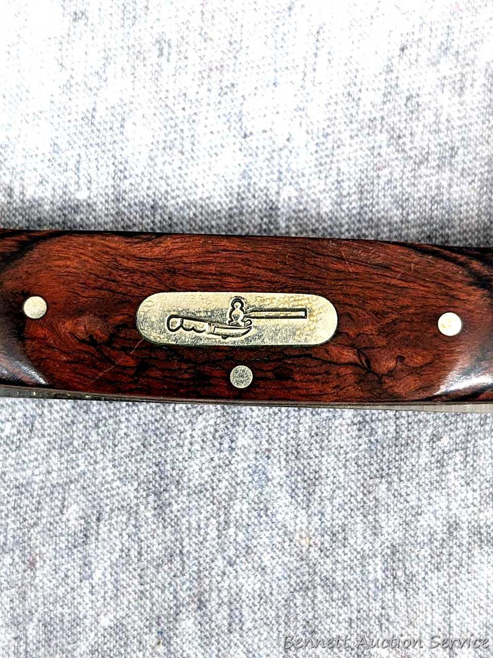 Folding Buck blade pocket knife, handle measures 3-3/4" long. Buck 389, blades are tight as are