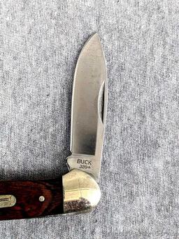 Folding Buck blade pocket knife, handle measures 3-3/4" long. Buck 389, blades are tight as are