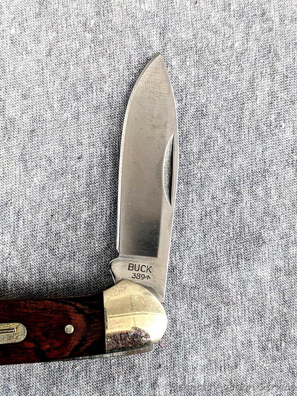 Folding Buck blade pocket knife, handle measures 3-3/4" long. Buck 389, blades are tight as are