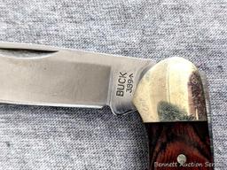 Folding Buck blade pocket knife, handle measures 3-3/4" long. Buck 389, blades are tight as are