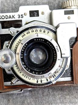 Vintage 1940s Kodak 35 Anastigmat Camera in deluxe field case. Camera appears to be in good