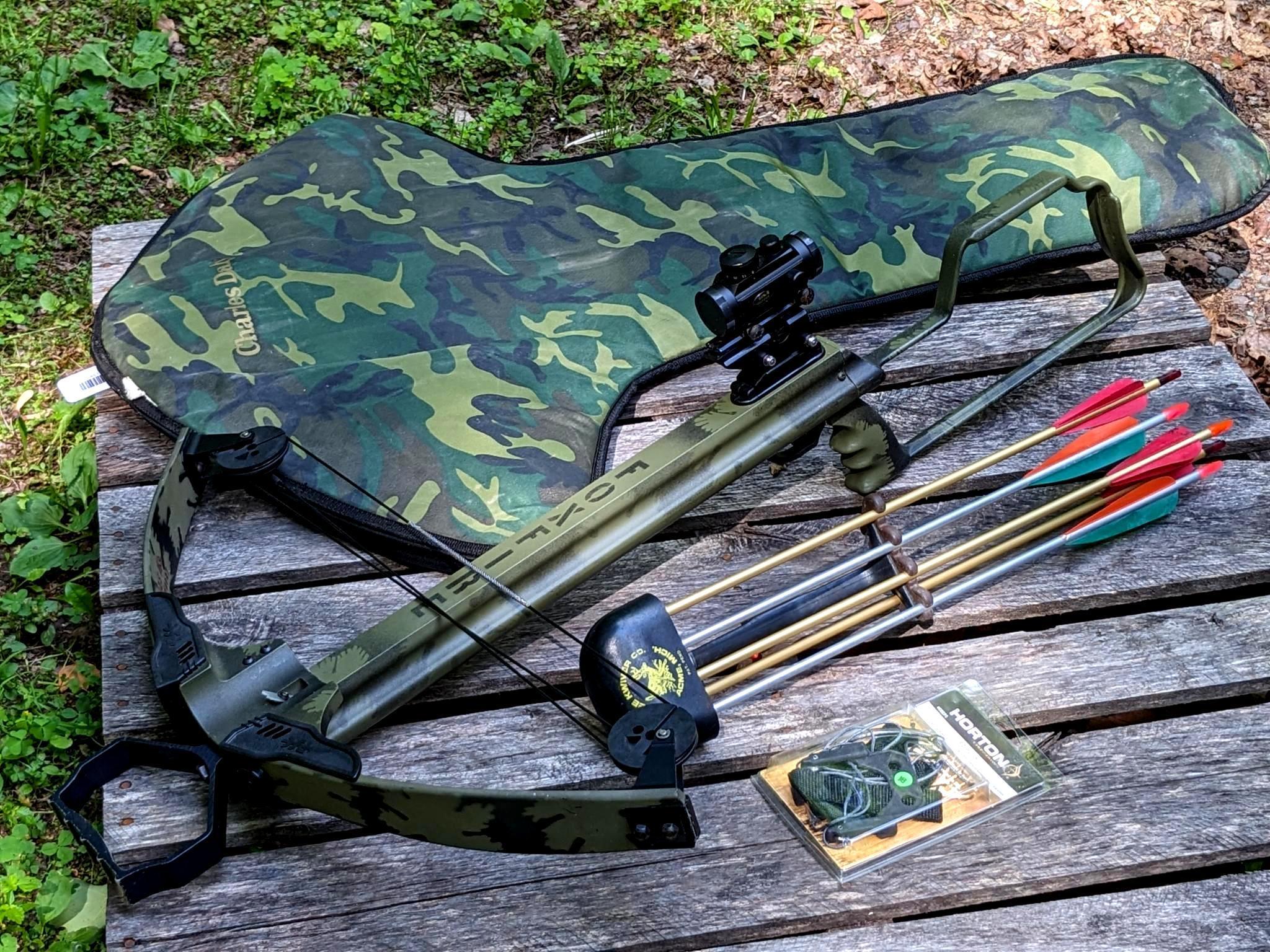 PSE Foxfire cross bow with five bolts, quiver, Horton cocking harness and Charles Daly case.