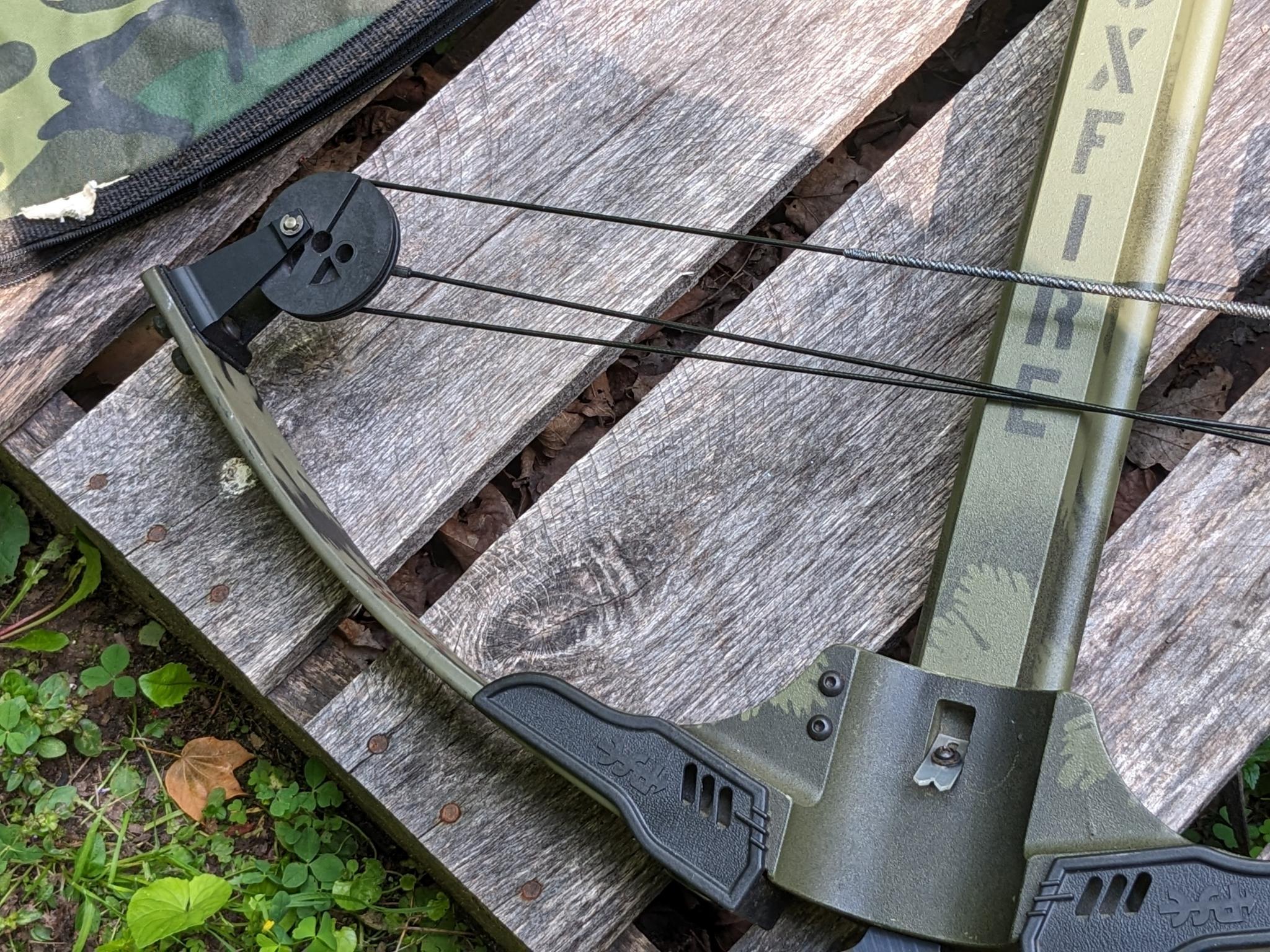 PSE Foxfire cross bow with five bolts, quiver, Horton cocking harness and Charles Daly case.