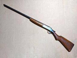 Iver Johnson Champion top break 12 gauge shotgun. The 30" barrel has a bright bore. Bluing is mostly