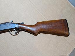 Iver Johnson Champion top break 12 gauge shotgun. The 30" barrel has a bright bore. Bluing is mostly