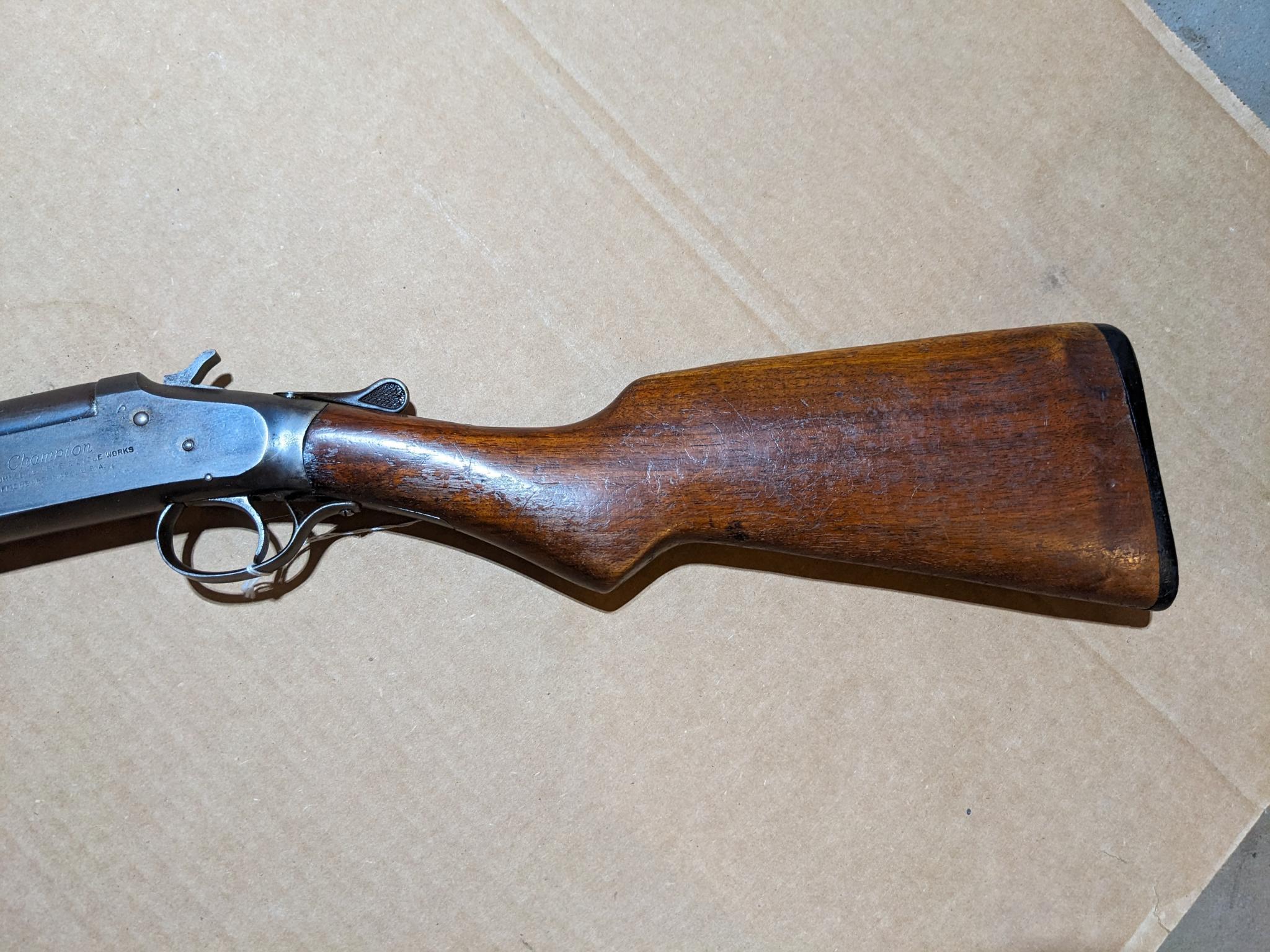 Iver Johnson Champion top break 12 gauge shotgun. The 30" barrel has a bright bore. Bluing is mostly