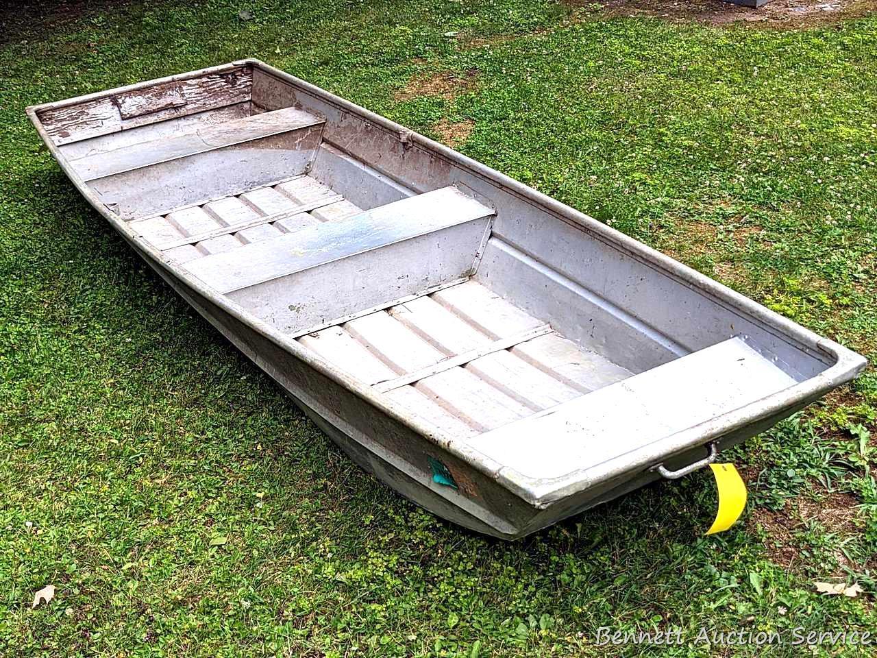 10' aluminum jon boat is in good condition with some silicone repairs.