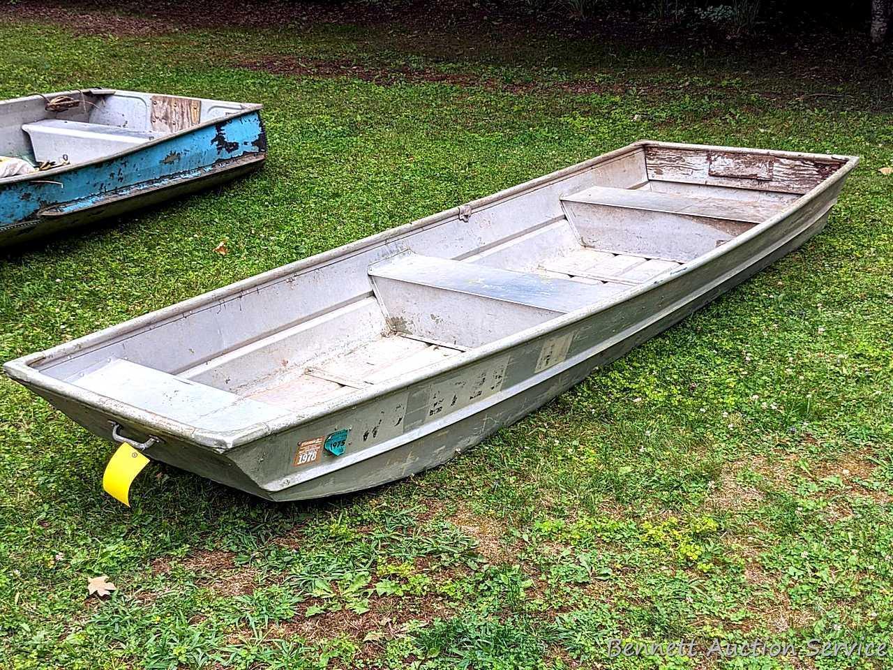 10' aluminum jon boat is in good condition with some silicone repairs.