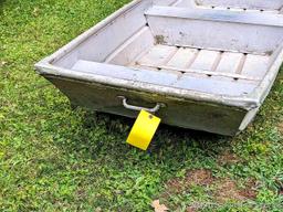 10' aluminum jon boat is in good condition with some silicone repairs.