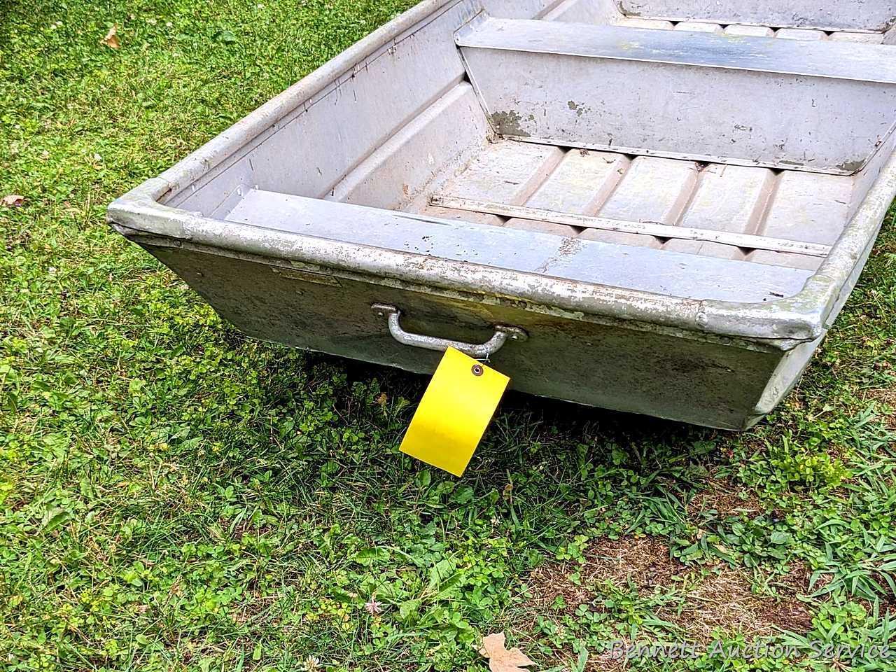 10' aluminum jon boat is in good condition with some silicone repairs.