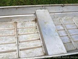 10' aluminum jon boat is in good condition with some silicone repairs.