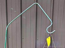 Unique shepherd's hook display two pretty floral solar lamps; watering can, planters up to 17".