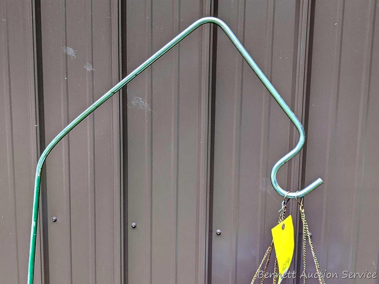 Unique shepherd's hook display two pretty floral solar lamps; watering can, planters up to 17".