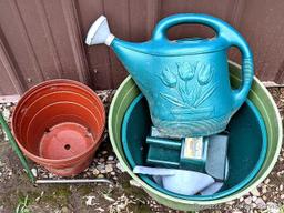 Unique shepherd's hook display two pretty floral solar lamps; watering can, planters up to 17".