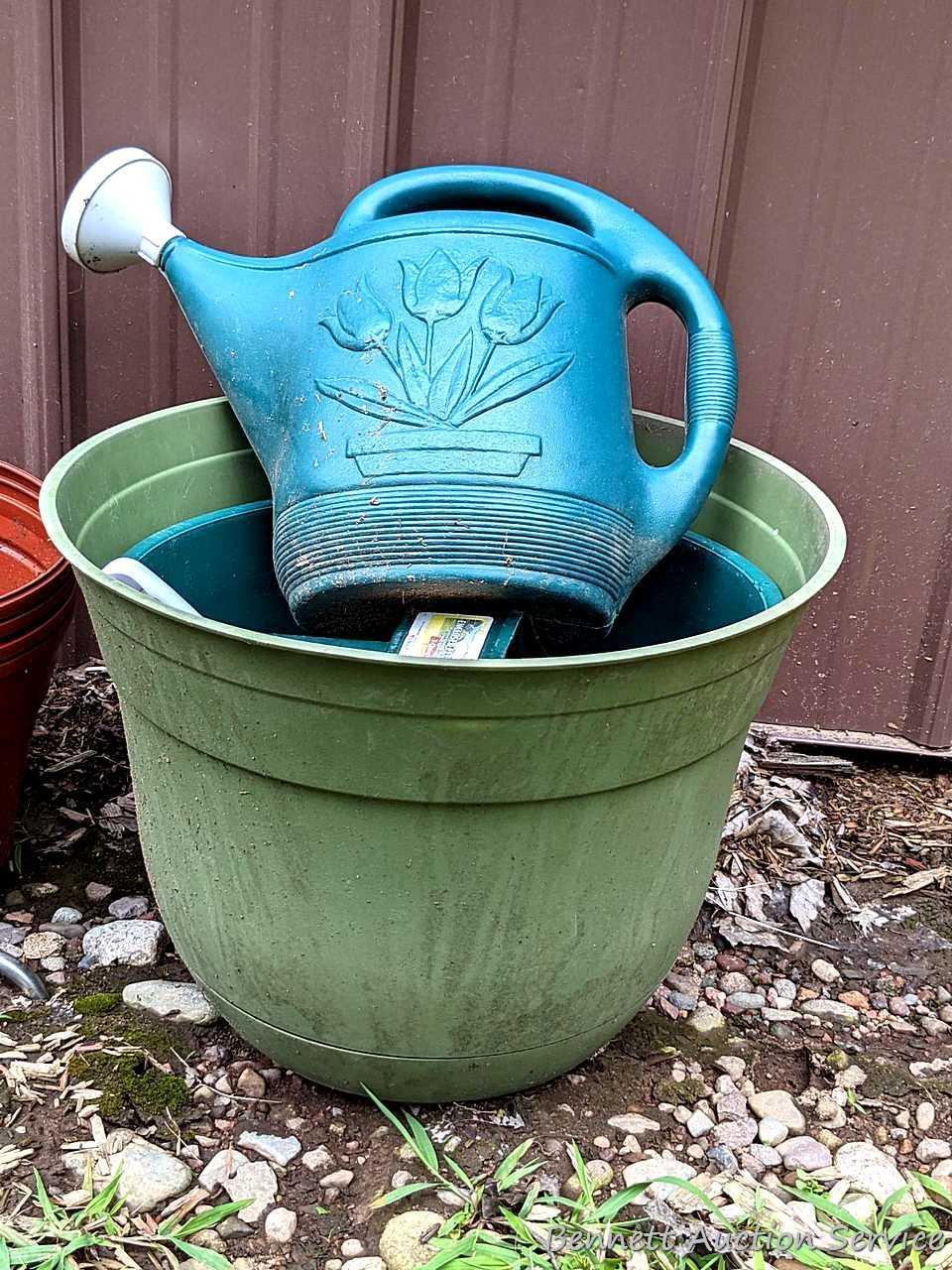 Unique shepherd's hook display two pretty floral solar lamps; watering can, planters up to 17".
