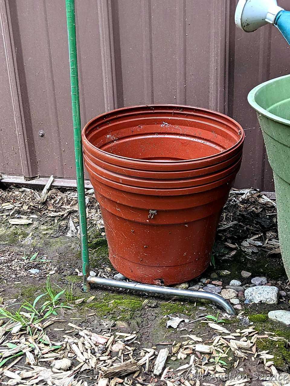 Unique shepherd's hook display two pretty floral solar lamps; watering can, planters up to 17".