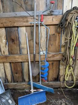 2' wide push broom and metal snow shovel, plus an ice auger and spade shovel.
