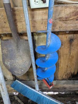 2' wide push broom and metal snow shovel, plus an ice auger and spade shovel.