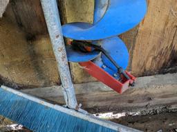 2' wide push broom and metal snow shovel, plus an ice auger and spade shovel.