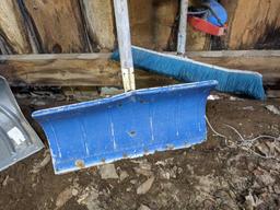 2' wide push broom and metal snow shovel, plus an ice auger and spade shovel.