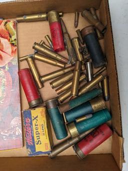 Meat cook book, plus ammunition including .22 long, 16 gauge, 12 gauge, .410 shot shells, .22LR,