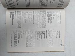 Meat cook book, plus ammunition including .22 long, 16 gauge, 12 gauge, .410 shot shells, .22LR,