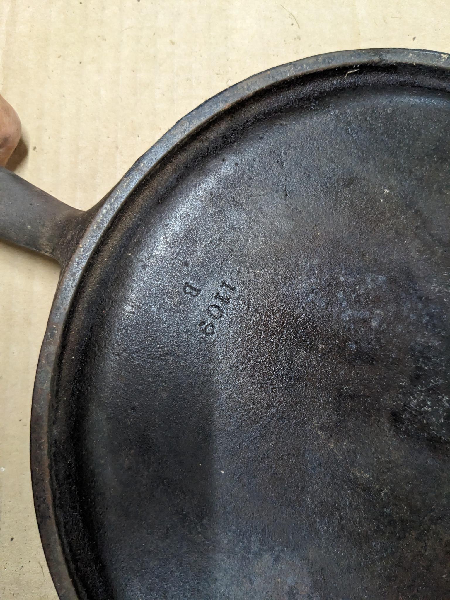 Wagner Ware Sidney, O cast iron griddle is marked 1109B.