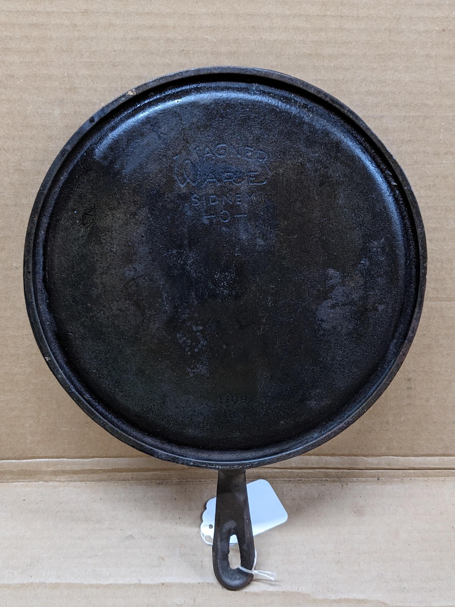 Wagner Ware Sidney, O cast iron griddle is marked 1109B.