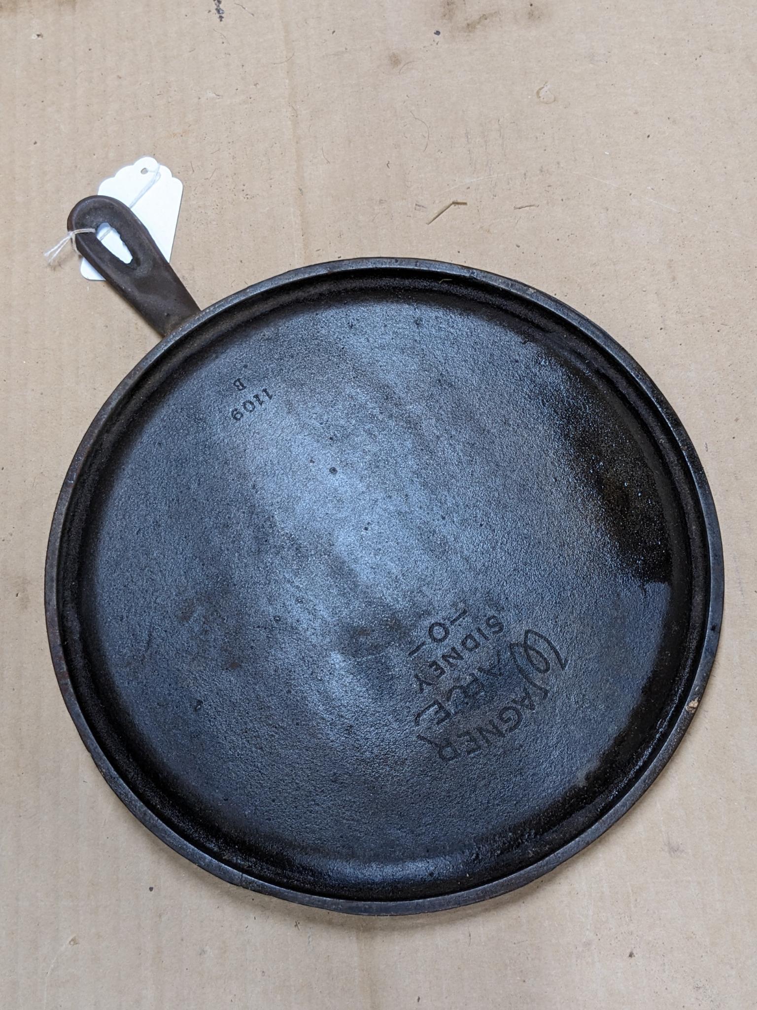 Wagner Ware Sidney, O cast iron griddle is marked 1109B.