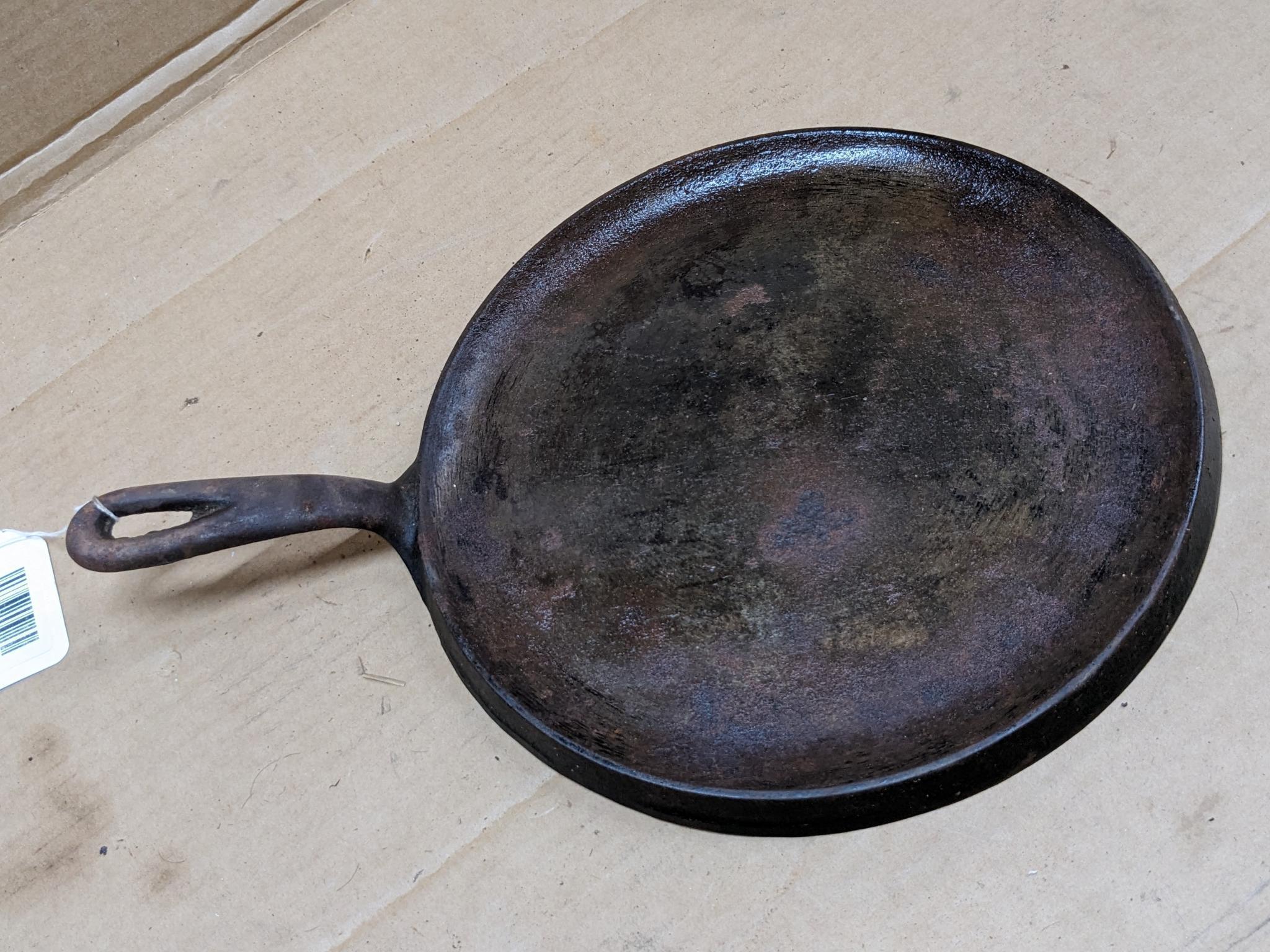 Wagner Ware Sidney, O cast iron griddle is marked 1109B.