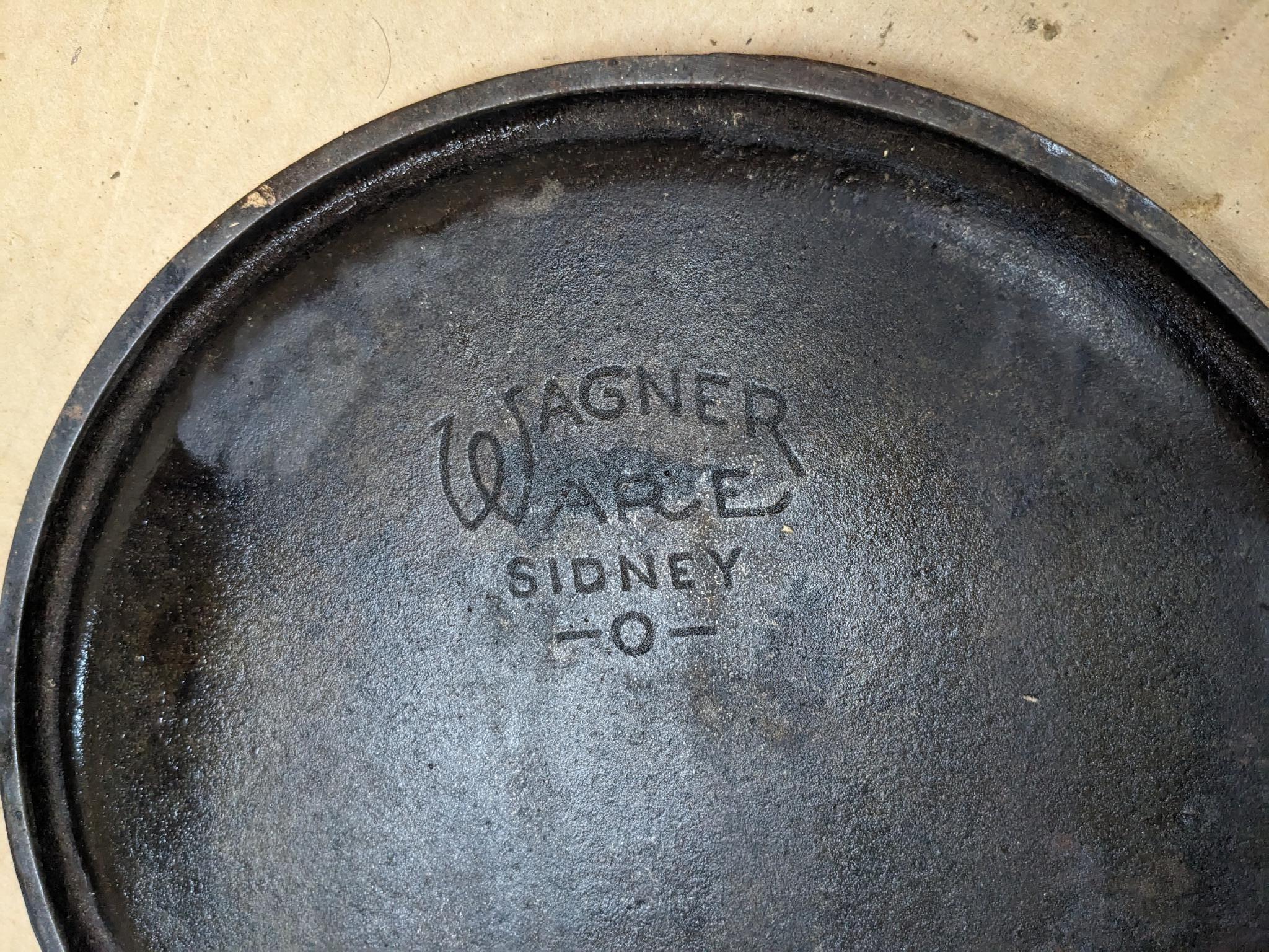 Wagner Ware Sidney, O cast iron griddle is marked 1109B.