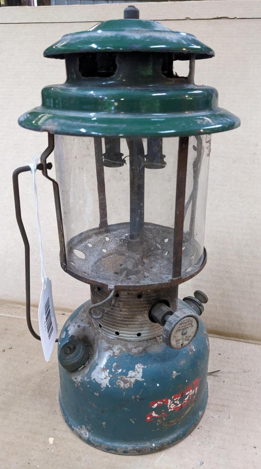 Coleman Model 220F lantern has the Coleman sunburst on the bottom and date code 9-64.